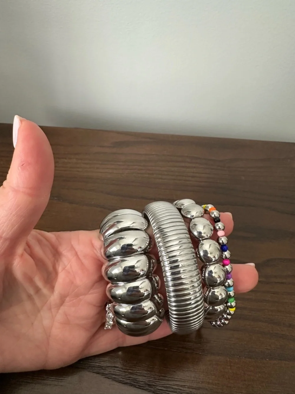 Set of Silver Tone Bangle Bracelets with Rainbow Beaded Accent - Picture 2 of 3